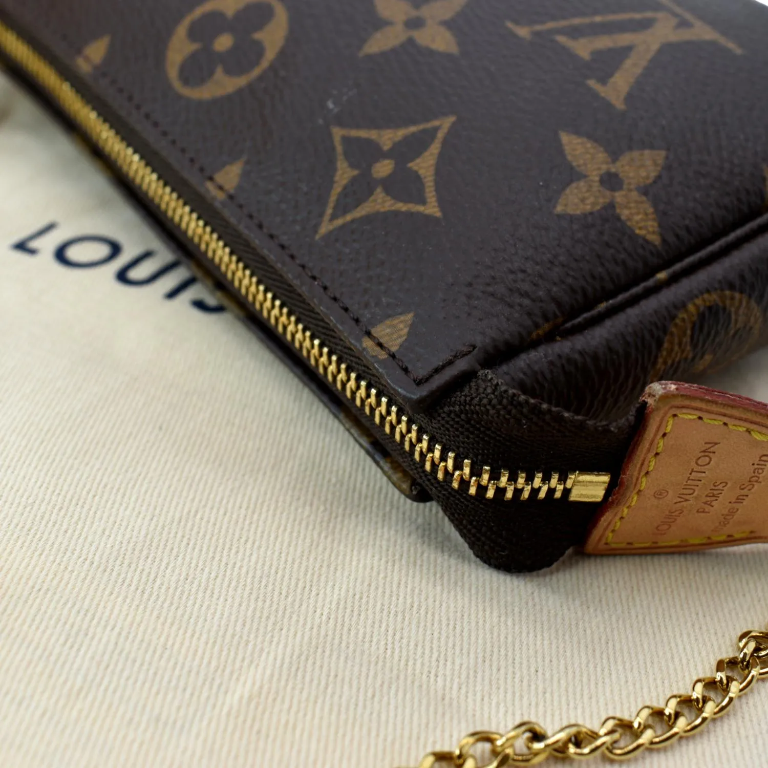LOUIS VUITTON Mini Pochette Monogram Canvas Accessories Pouch Brown