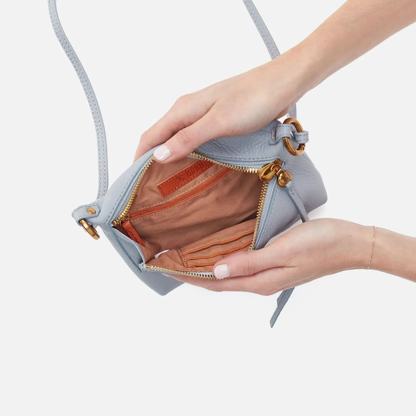 Run About Crossbody In Pebbled Leather - Blue Pearl