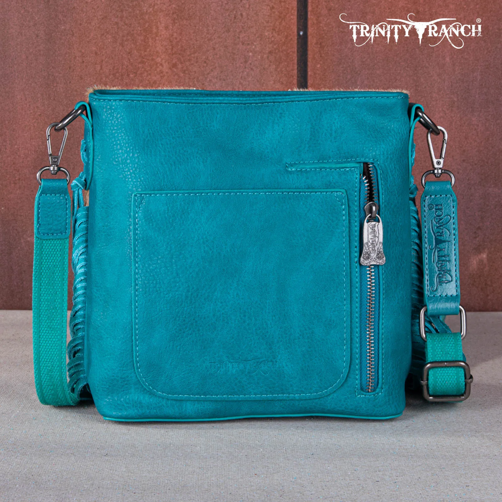 TR159G-9360   Trinity Ranch Hair-On Cowhide/Tooled Fringe Concealed Carry Crossbody Bag