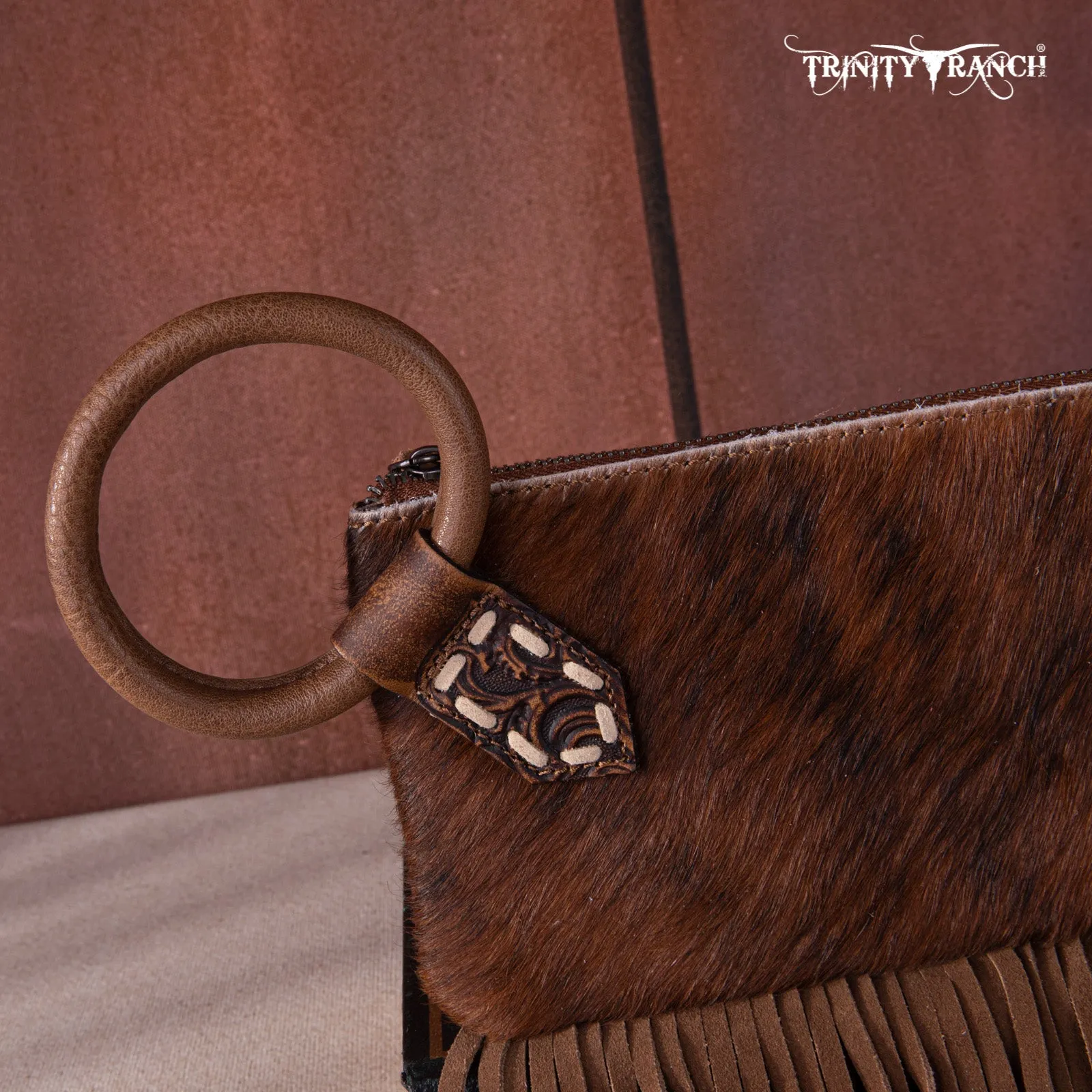 TR167-A181 Trinity Ranch Genuine Hair-On Cowhide Ring Handle Wristlet Clutch Bag - Black