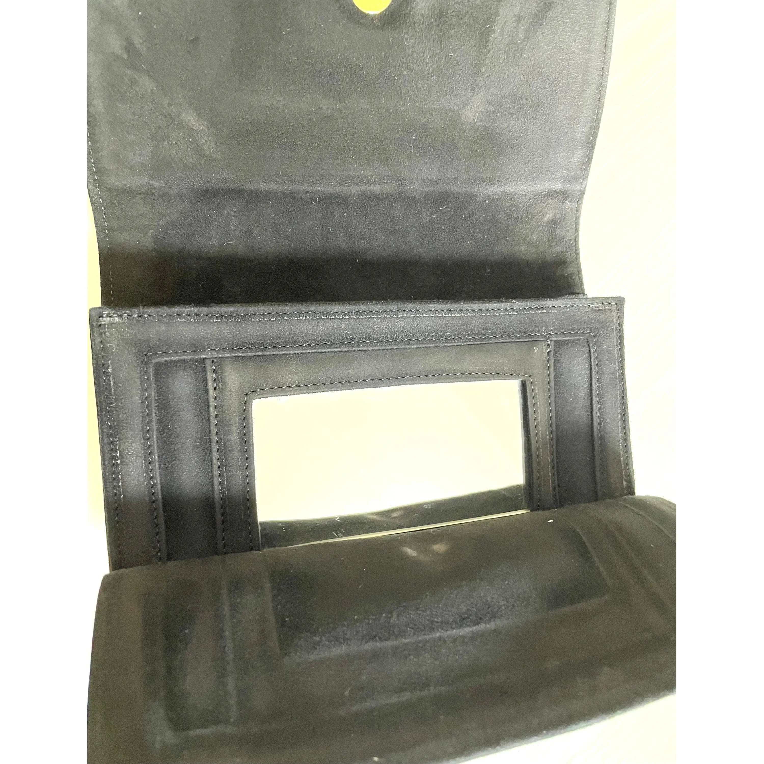 Vintage Bottega Venetia black suede clutch bag with bow motif and a built-in mirror. 051009ap2